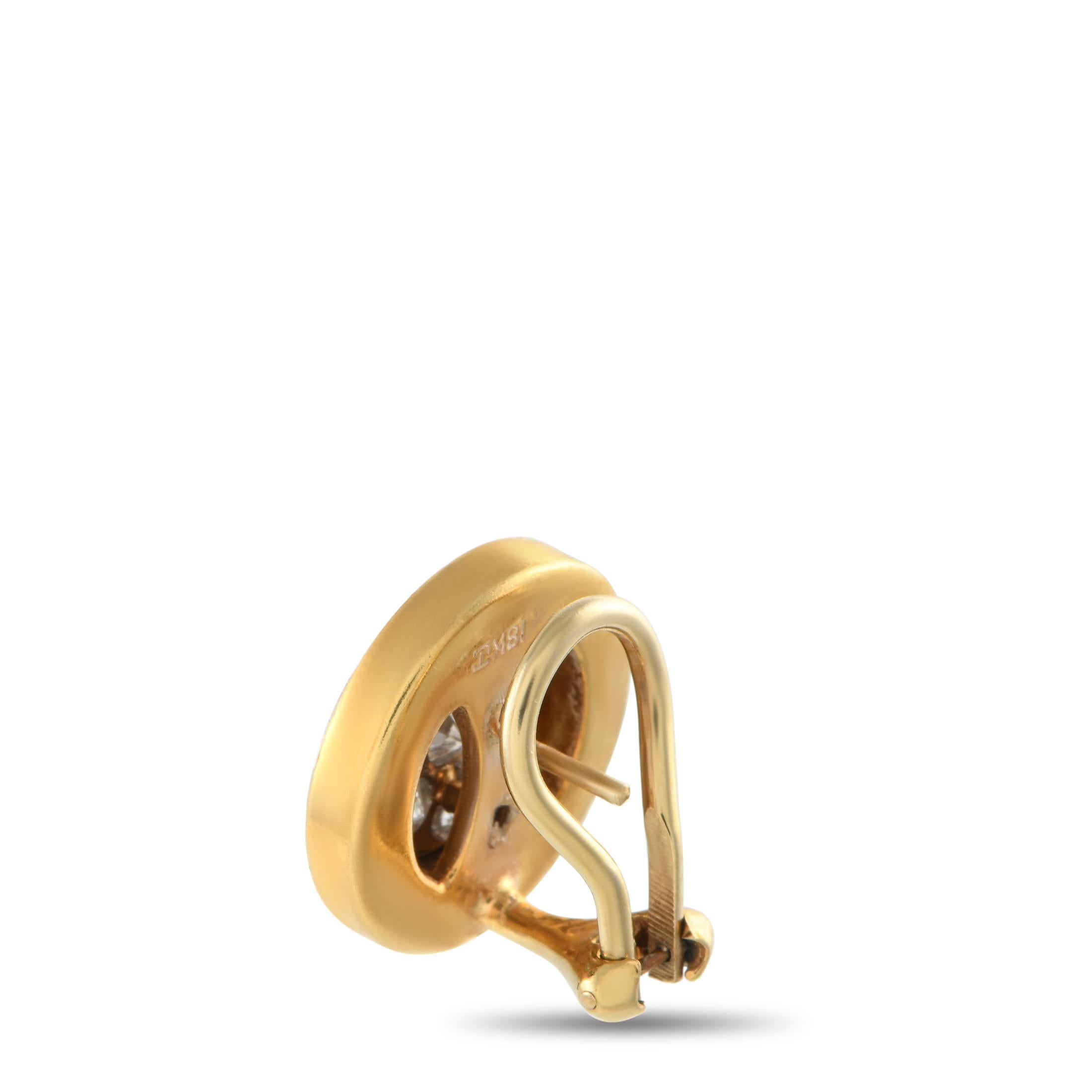 A striking geometric design makes these earrings instantly eye-catching. At the center of the round 18K Yellow Gold setting, Diamonds totaling 1.0 carats effortlessly catch the light. Black enamel around the edge of the design creates beautiful