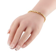 Pulsera de oro amarillo de 18 quilates con 1,0 ct de diamantes y rubíes MF42-020326