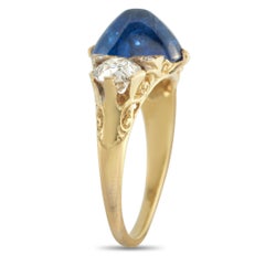 Anillo de oro amarillo de 18 quilates con un diamante y un zafiro de 1,0 ct MF16-050726