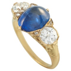 Anillo de oro amarillo de 18 quilates con un diamante y un zafiro de 1,0 ct MF16-050726