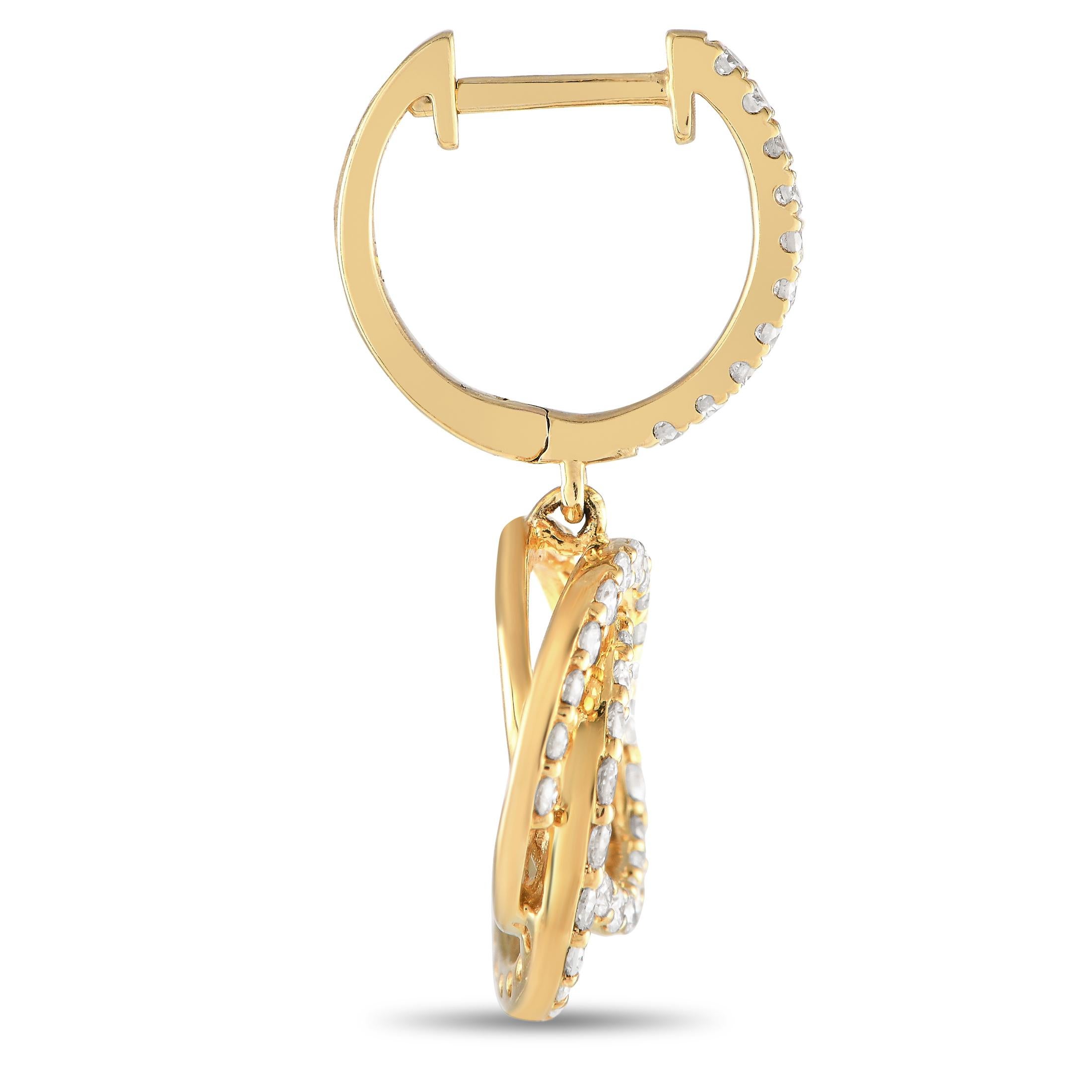 Interlocking circular accents make these earrings incredibly captivating. Sparkling diamonds with a total weight of 1.0 carats contrast beautifully against the lustrous 18K yellow gold settings. Each one measures 1.0 long by 0.50 wide.This jewelry