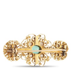 18K Gelbgold 1,10ct Smaragd Brosche