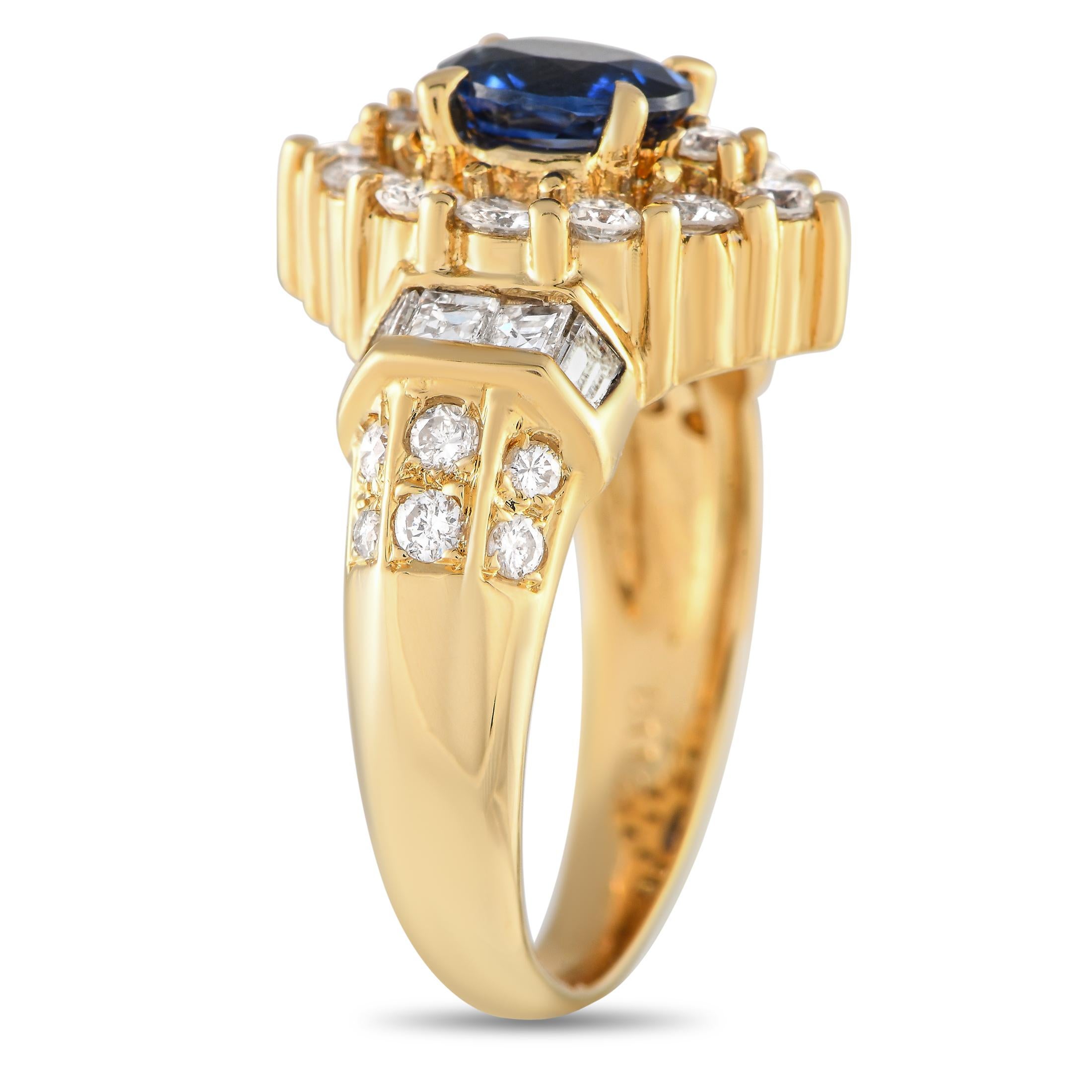 This opulent 18K Yellow Gold ring is a luxury piece that will continually make a statement. A captivating 0.97 carat Sapphire center stone is surrounded by sparkling Diamond accents totaling 1.12 carats on this impressive piece, which features a 4mm