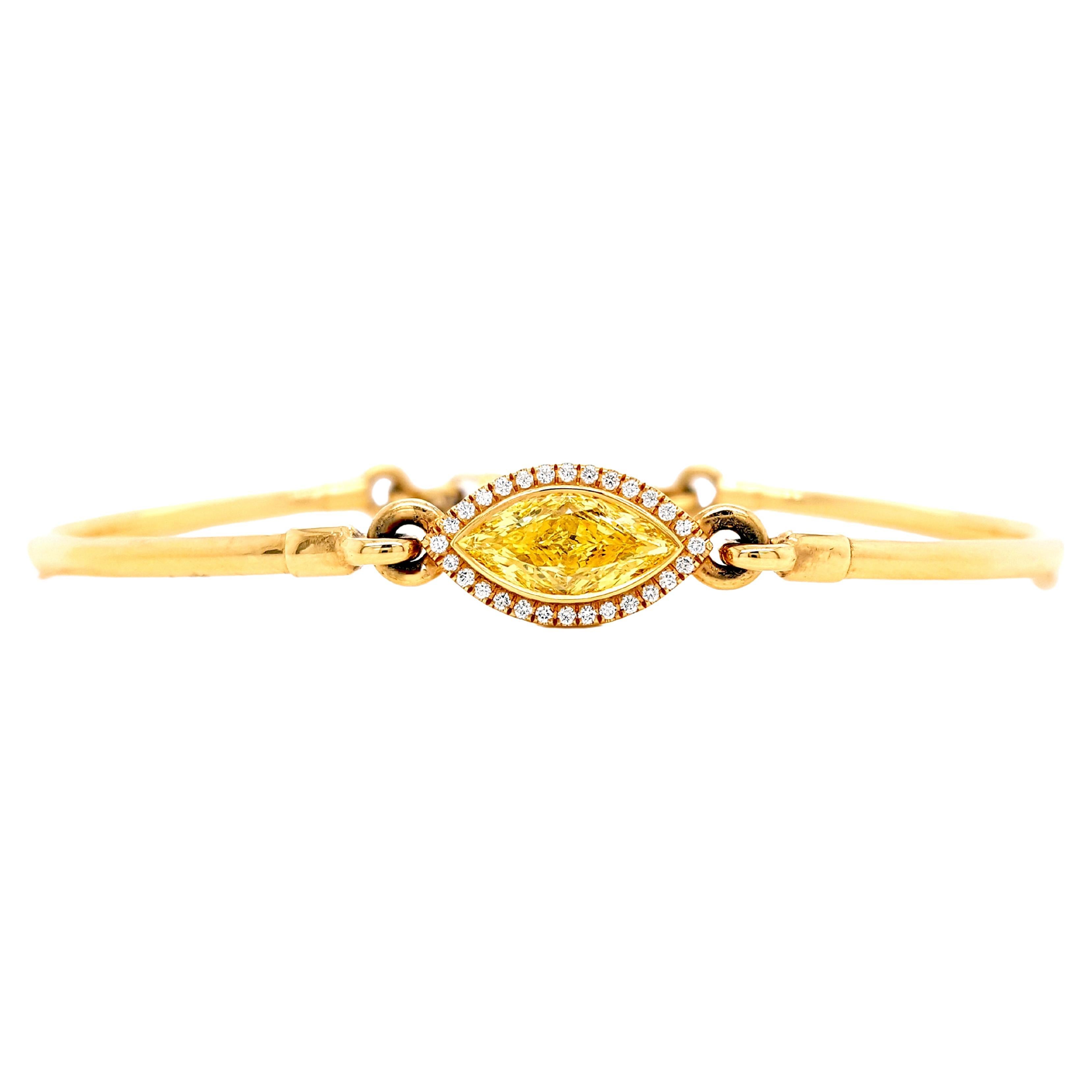 18k Yellow Gold, 1.13 Carat Fancy Intense Yellow Marquis-Cut Diamond Halo Bangle For Sale