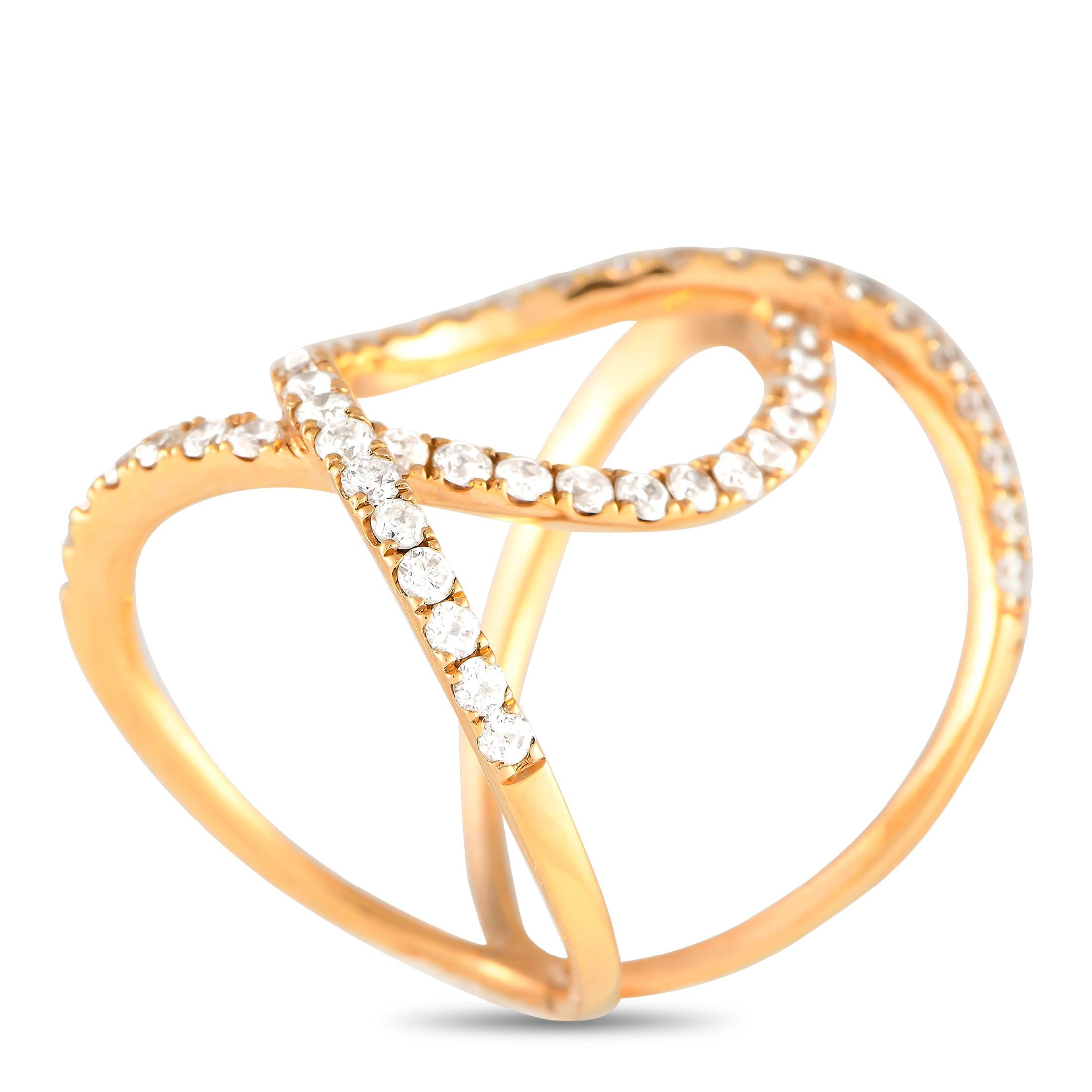 This impeccably crafted ring is simply unforgettable. Elegant 18K Yellow Gold bands are beautifully intertwined on this piece, which seemingly radiates light thanks to 1.15 carats of sparkling inset Diamonds. Unique and incredibly elegant, it