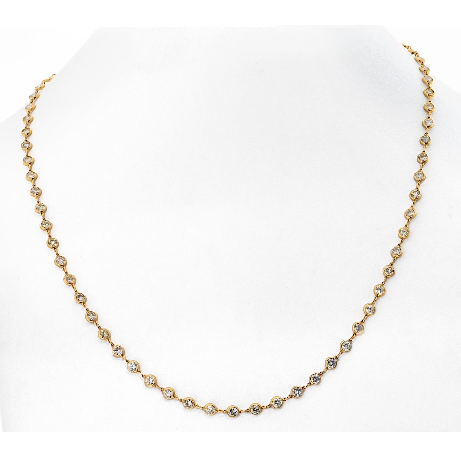 Introducing a truly enchanting piece of jewelry – the Beautiful Handmade Diamond by the Yard Necklace in 18K Yellow Gold. 

This exquisite necklace features a remarkable 11.68 carats of natural round brilliant-cut diamonds, each hand-set in radiant