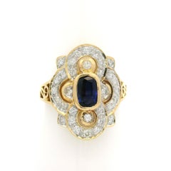 18k Yellow Gold 1.24ctw Cushion Sapphire 
Round Diamond Floral Elongated Ring