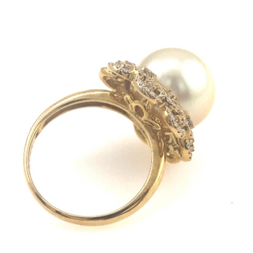 18K Yellow Gold 12.5 mm South Sea Pearl Golden Pearl Ring with Diamonds

120 Diamonds - 0.45 CT
1 South Sea Golden Pearl - 12.5 mm
Total Weight - 8.08 GM

Highly Customizable.
Soft golden champagne-colored pearls, set with sparkling F color