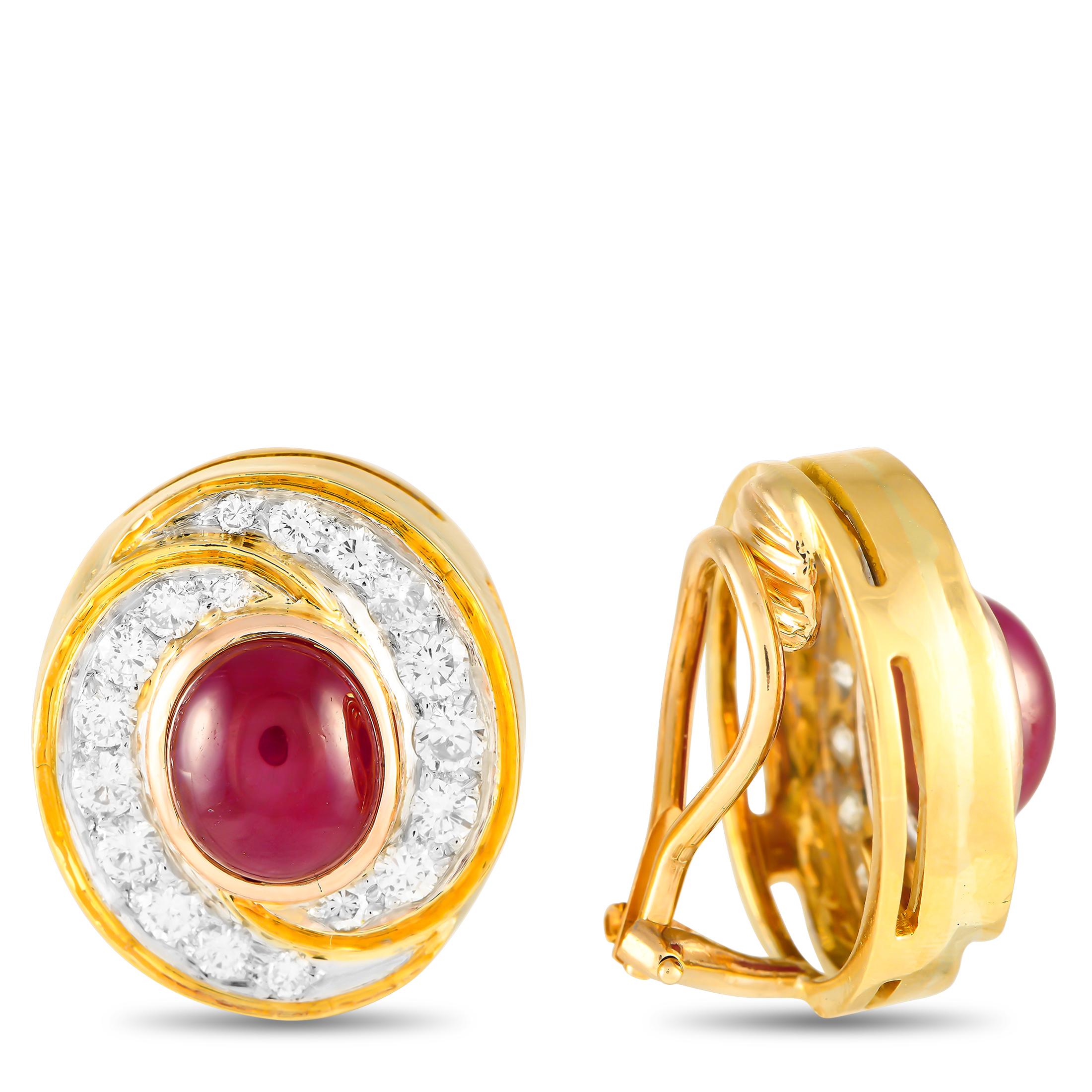 Blending color and brilliance, these diamond and ruby clip-on earrings is the perfect piece to match your unique style. The earrings are crafted in 18K gold and have a circular shape. A ruby cabochon sits at the center of each earring, surrounded by