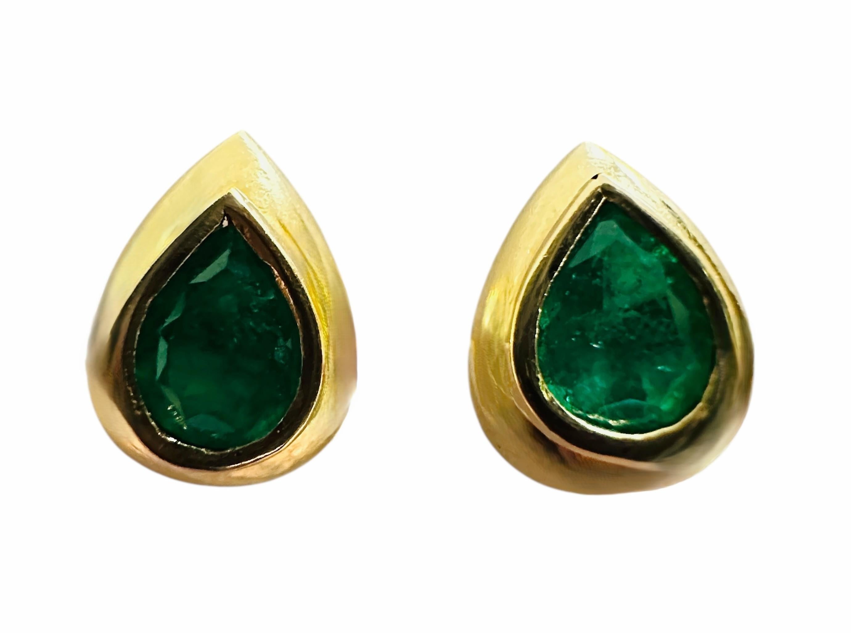 I love these earrings.   The design is simple and elegant.  There are 2 pear cut .65 carat emeralds in each earring.  Both earrings total 1.30 carats of emeralds.  The earrings are stamped 