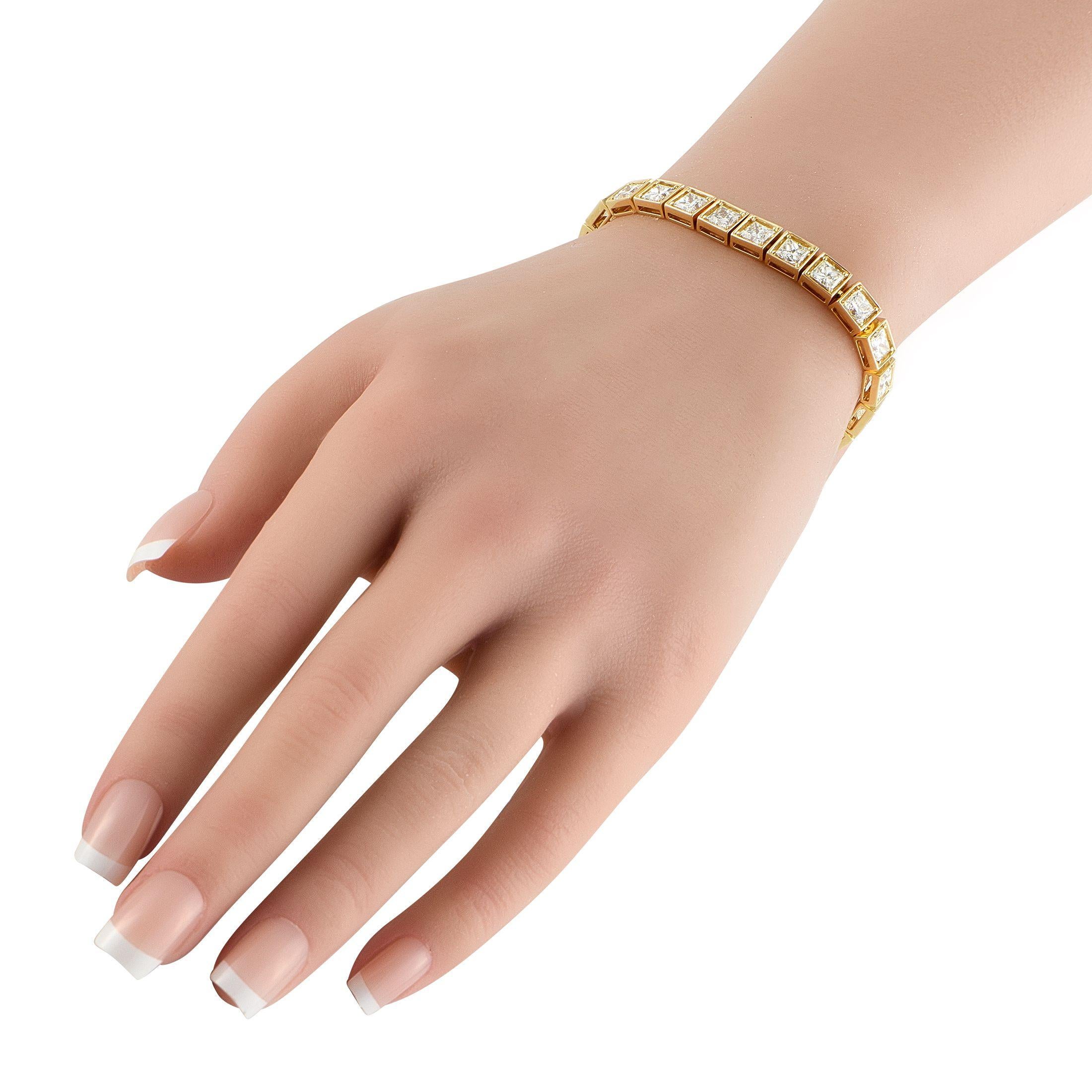 A classic design makes this bracelet truly timeless. Set in 18K Yellow Gold, square-cut Diamonds with a total weight of 13.20 carats allow it to seemingly radiate light every time it's worn. It measures 7.0 long.This jewelry piece is offered in