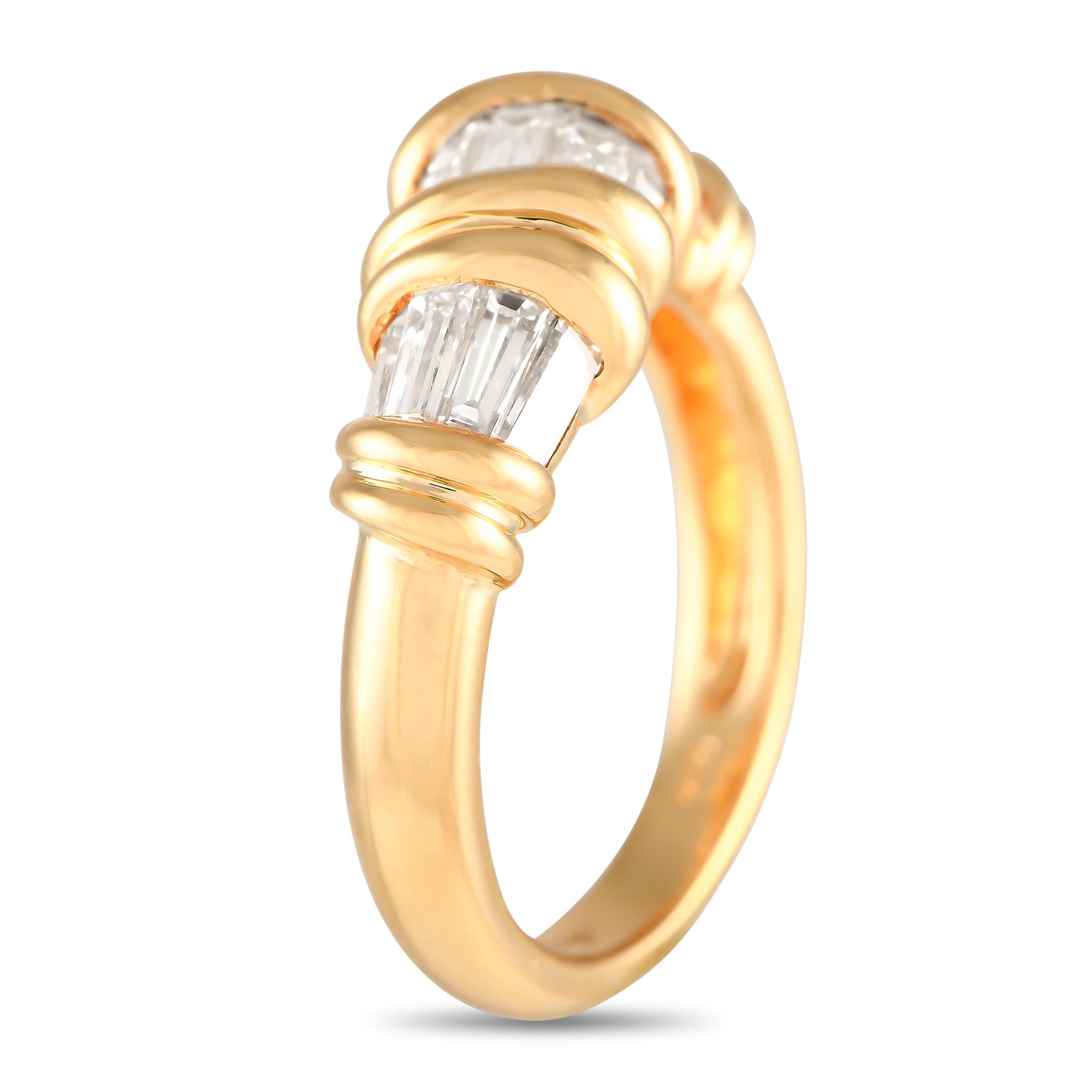 Curved lines and rounded edges give this luxury ring a distinct sense of movement. The 18K yellow gold setting beautifully showcases an array of diamond baguettes, which together possess a total weight of 1.47 carats. This piece features a 3mm band