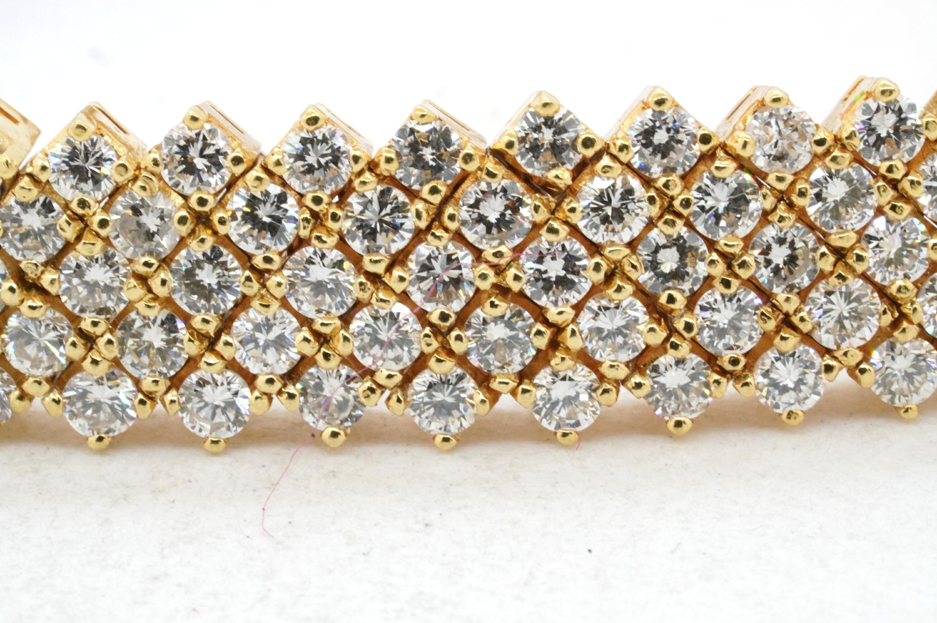 18k yellow gold 14ct VS clarity diamond five row line bracelet. This lovely brcelet is made from solid 18k yellow gold and features approx. 14cts worth of sparkling white diamonds. The diamonds are round cut and individually set, they have excellent