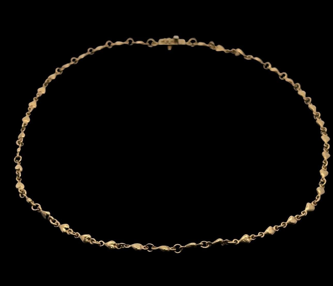 --Stone(s):-- 
(1) Natural Genuine Diamond - Round Brilliant Cut - Bezel Set - White Color - 0.02ct (approx.)

Material: Solid 18k Yellow Gold 
Weight: 17.38 Grams
Chain Type: 3.8mm Wide Puffed Heart Link Chain
Chain Length: 15 Inches
Clasp: Push
