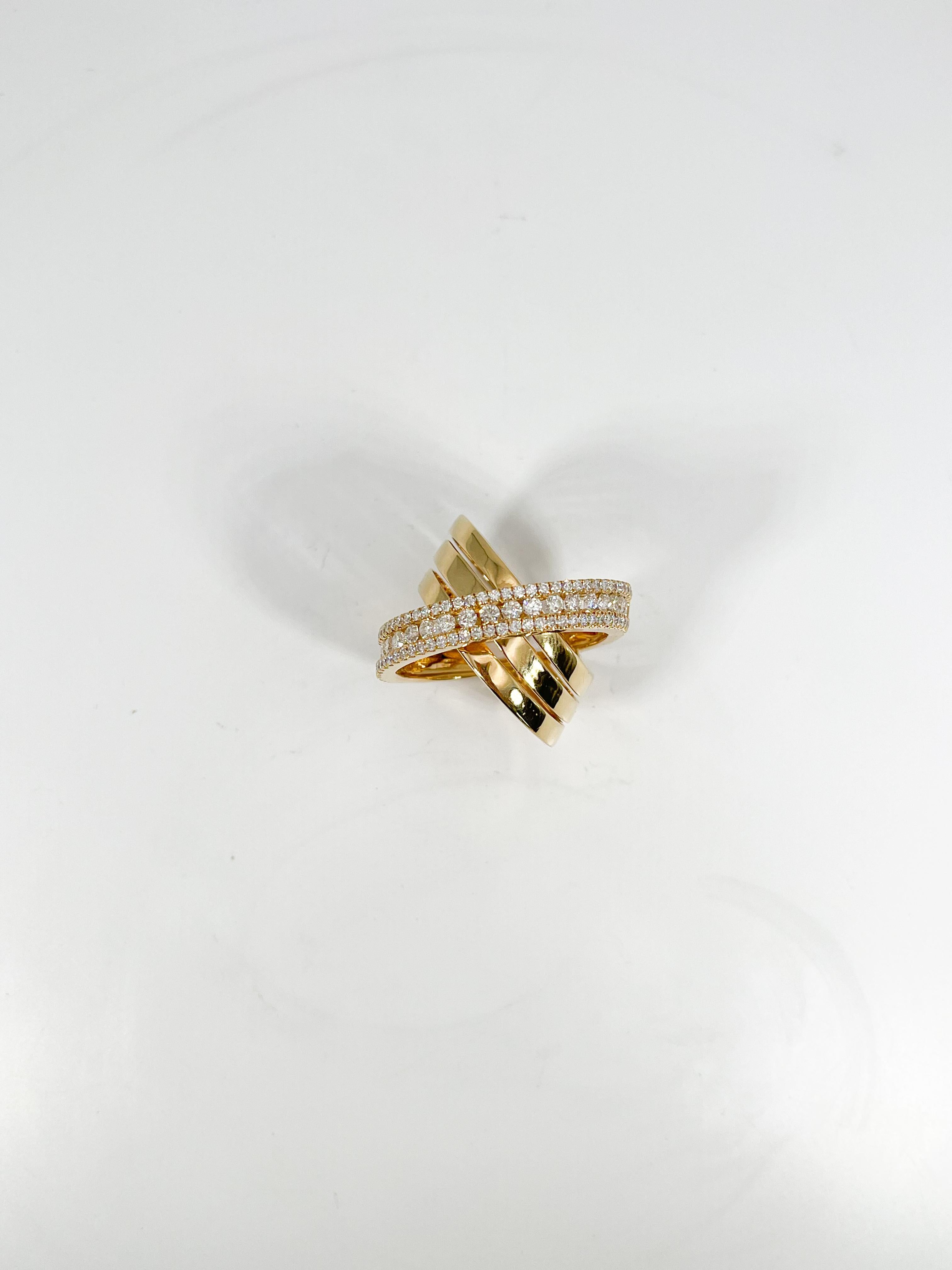 18k yellow gold 1.50 CTW large diamond crossover ring. The diamonds in this ring are all round, the width of the ring is 19.8 mm, the ring size is a 7, and it has a total weight of 14.6 grams.