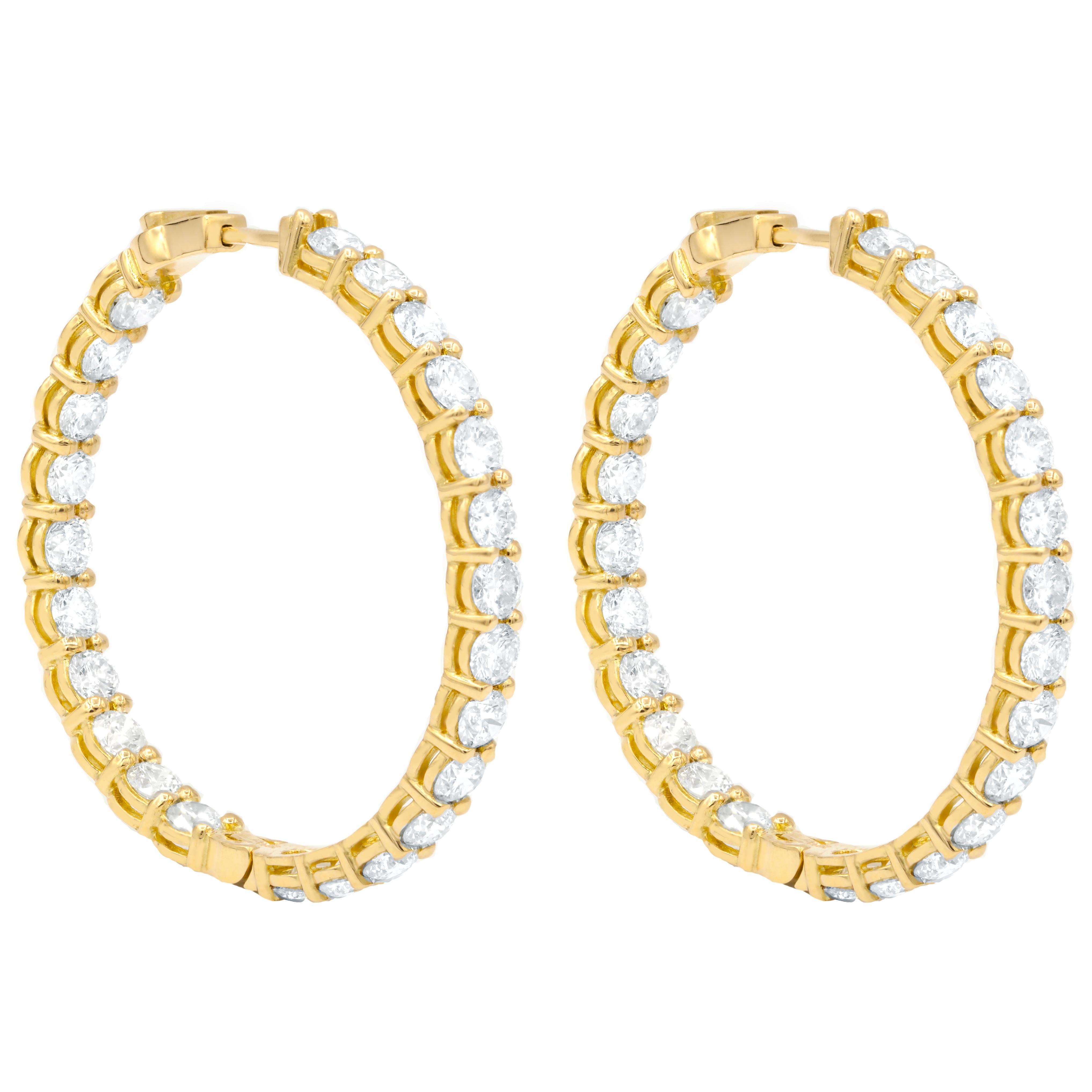
18K Yellow Gold Diamond Earrings featuring 15.00 Carat T.W. of Natural Diamonds 

• Crafted in Yellow Gold 
• 15.00 Carat White Diamonds
• 100% Natural Diamonds 
• Earrings
• High polish finish

Underline your look with this sharp 18K Yellow Gold