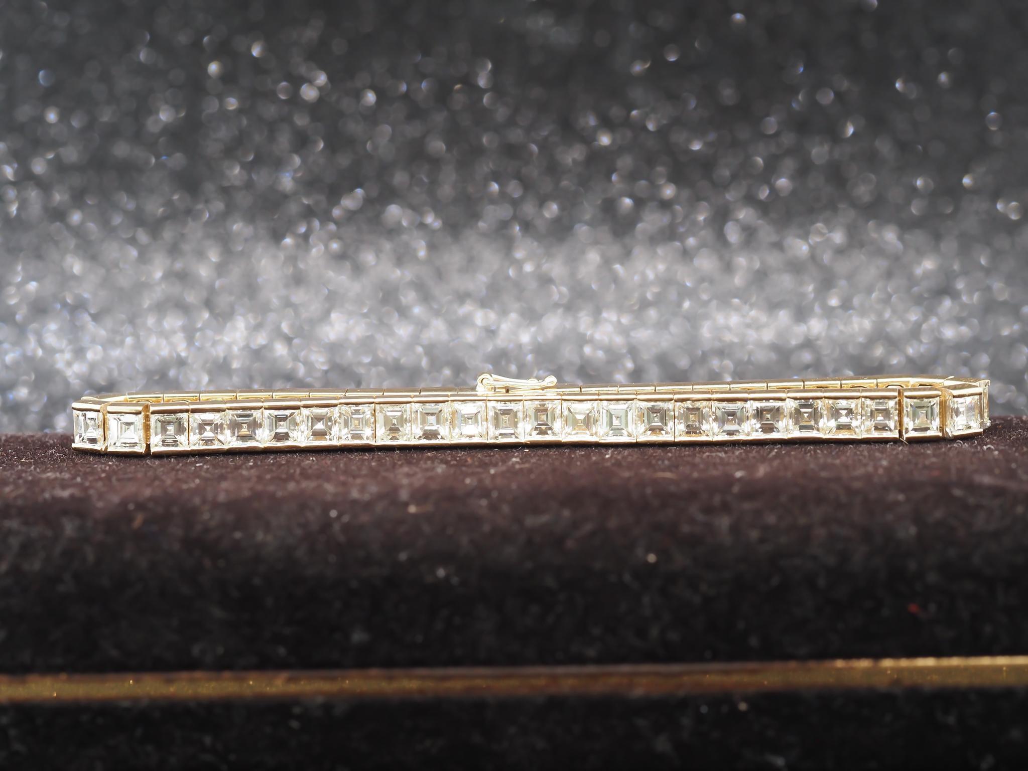 Year: 1980s
Item Details:
Metal Type: 18K Yellow Gold  [Hallmarked, and Tested]
Weight:  24.0 grams (All Items Total)
Diamond Details: 15.00ct total weight, G Color, VS Clarity, Carre Cut Diamonds, Natural.
Bracelet Length Measurement: 7  Inches