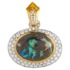 Pendentif en or jaune 18K serti d'un diamant de 1,50ct et d'une opale Boulder MF40-020326