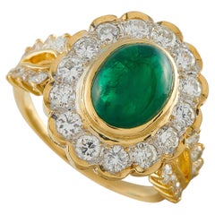 Anello in oro giallo 18 carati con diamante e smeraldo da 1,50 carati MF13-042926