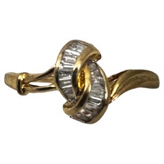 18k Gelbgold  Ring mit 16 Baguetteschliff-Diamanten in Kanalfassung  Größe 6 3/4