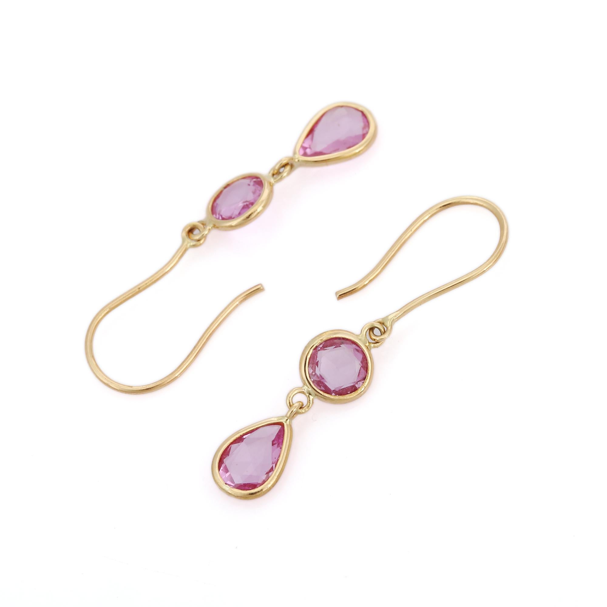 18K Yellow Gold Pink Sapphire Drop earrings to make a statement with your look. These earrings create a sparkling, luxurious look featuring pear and round cut gemstone.
If you love to gravitate towards unique styles, this piece of jewelry is perfect
