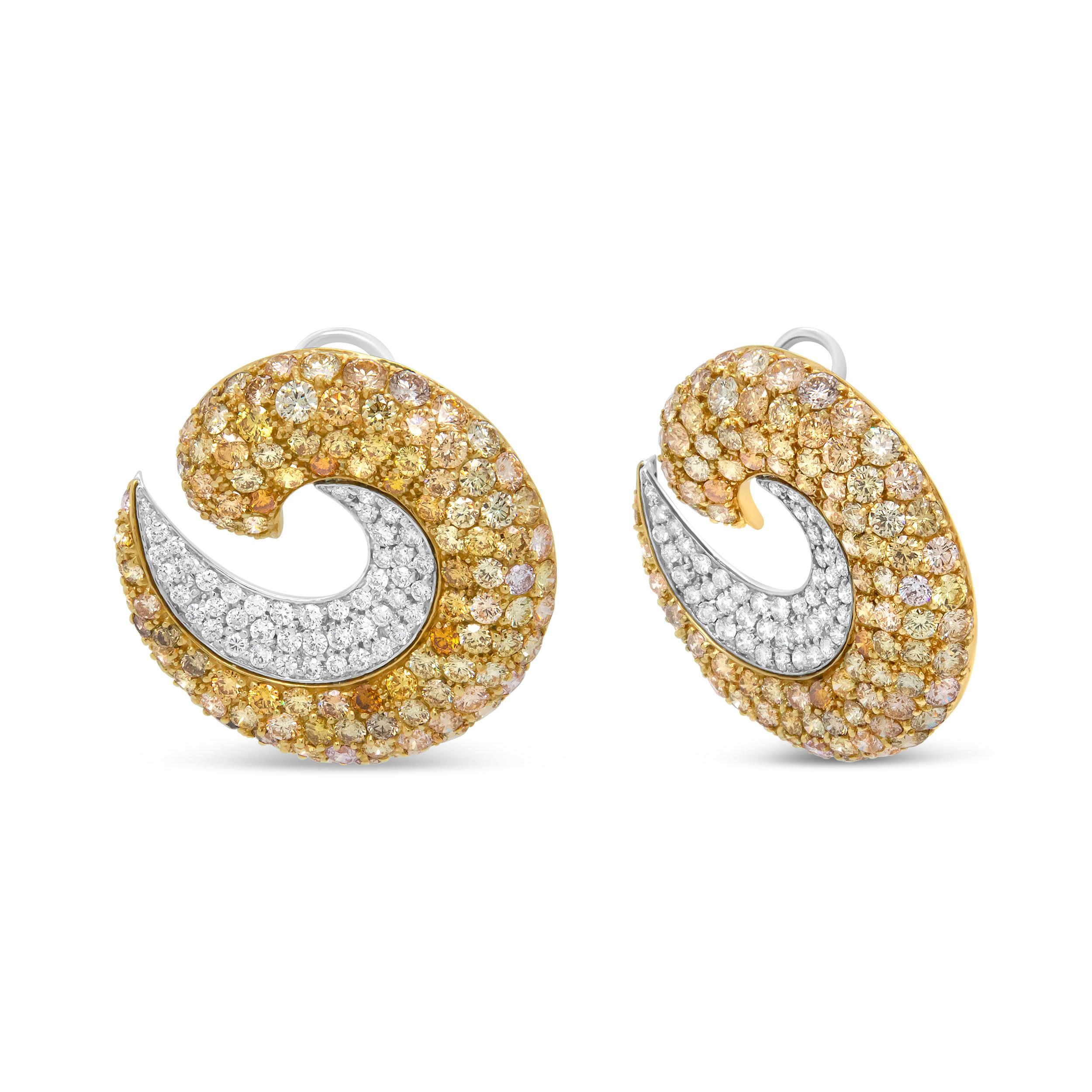 Details are key and play a major role in any true statement piece. This stunning pair of diamond swirl hoop earrings features intricate detailing that is subtle in its timeless elegance and bold in its unique approach. The graceful spiraling