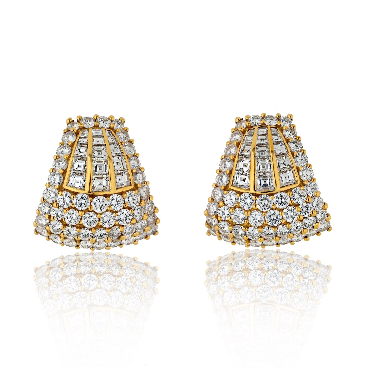 Step into the allure of the 1970s with these exquisite Estate Diamond Earrings, a testament to timeless elegance and refined craftsmanship. 

Crafted in 18K yellow gold, these clip-on earrings boast a dazzling array of diamonds, seamlessly blending