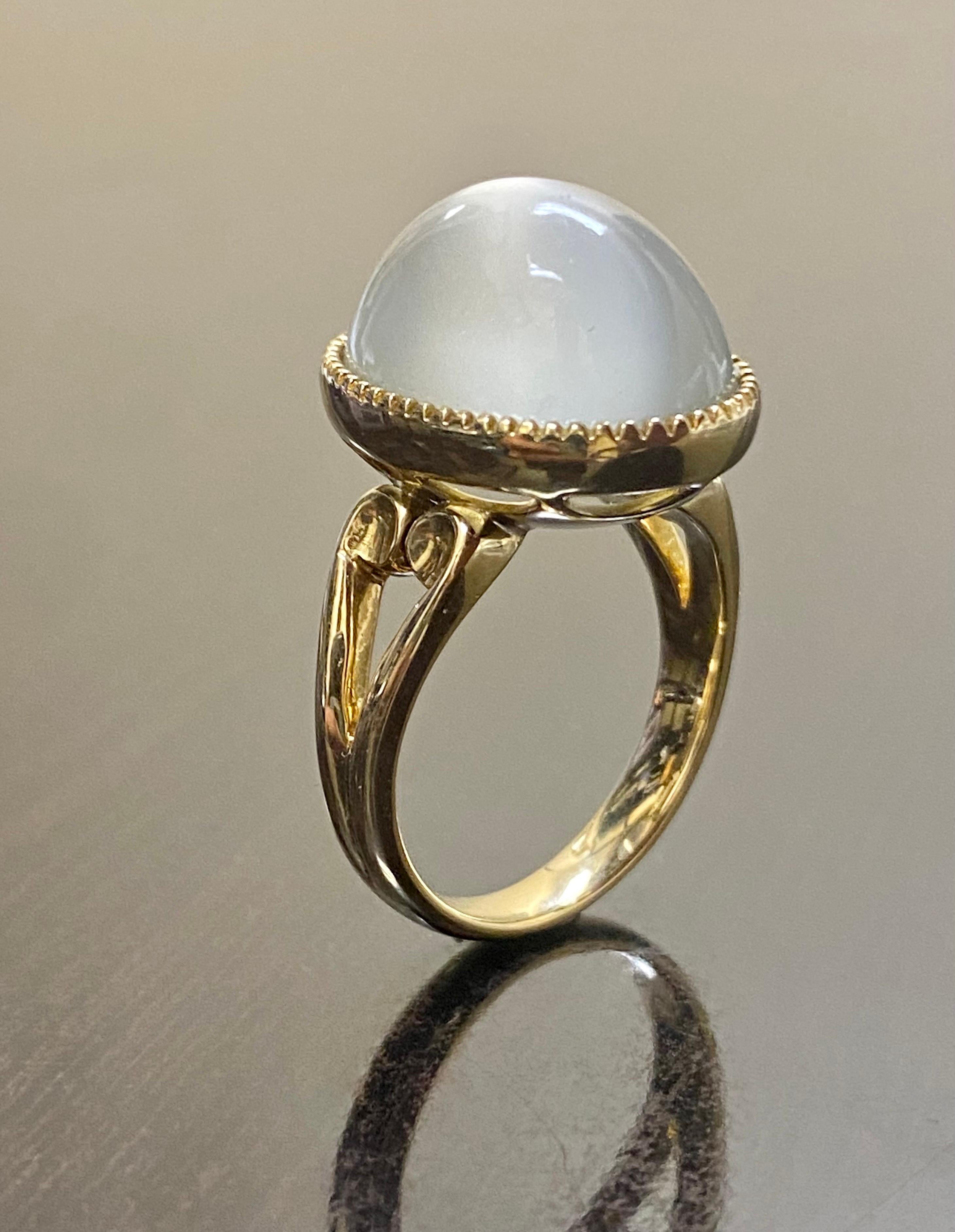 DeKara Designs Collection

Art Deco Inspired Extremely Elegant Handmade Oval Cabochon Moonstone Engagement Ring.

Metal- 18K Yellow Gold, .750.

Stones- 1 Genuine Oval Cabochon Moonstone 19.67 Carats.

Size- 8 3/4. FREE SIZING!!!!

An Amazing One of