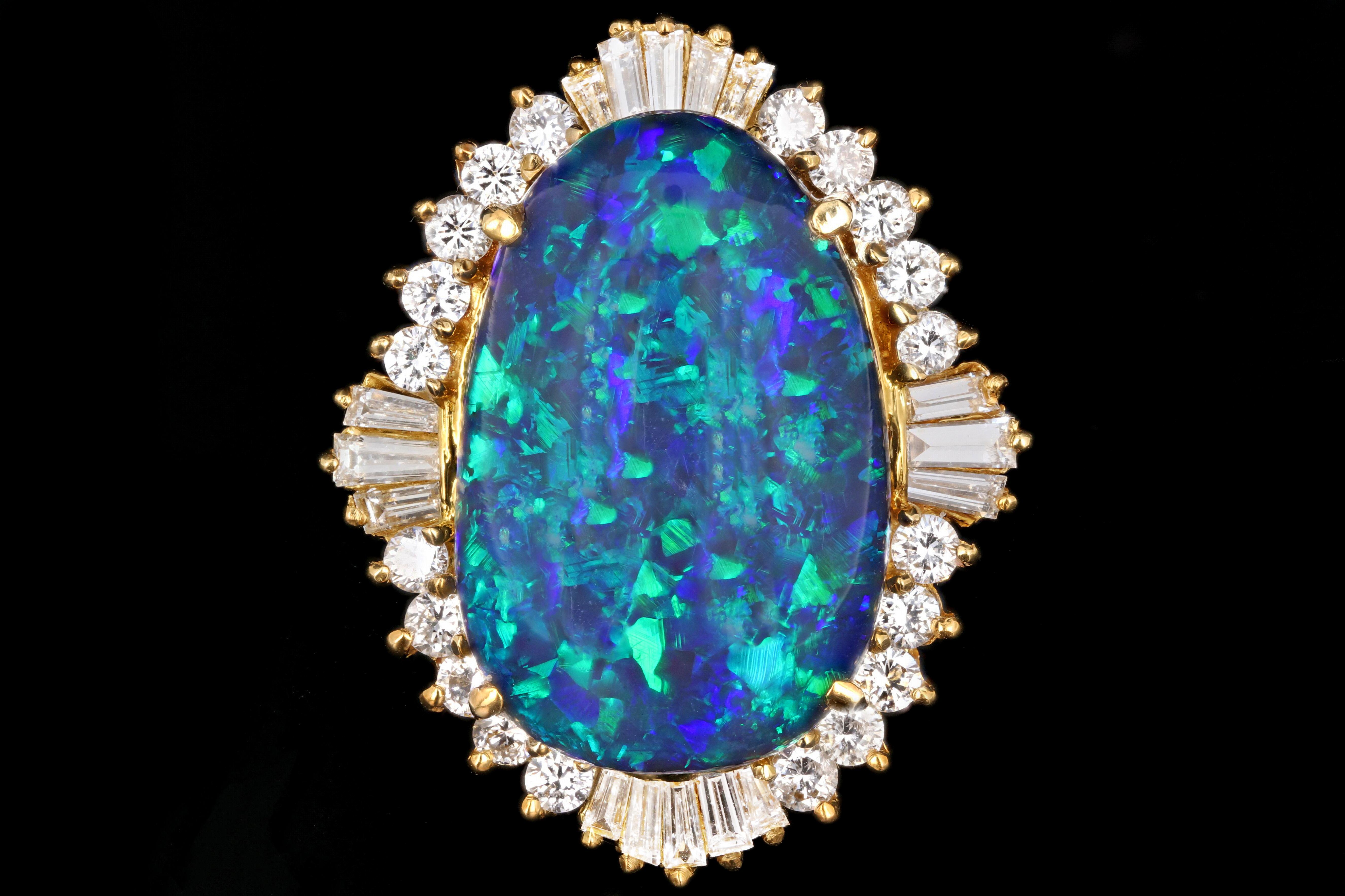 Era: Modern

Composition: 18K Yellow Gold

Primary Stone: Black Opal

Carat Weight: 20 Carats

Accent Stone: Baguette and Round Brilliant Cut Diamonds

Carat Weight: 2 Carats

Color: F-G

Clarity: Vs1/2

Total Carat Weight: 22 Carats

Ring Weight: