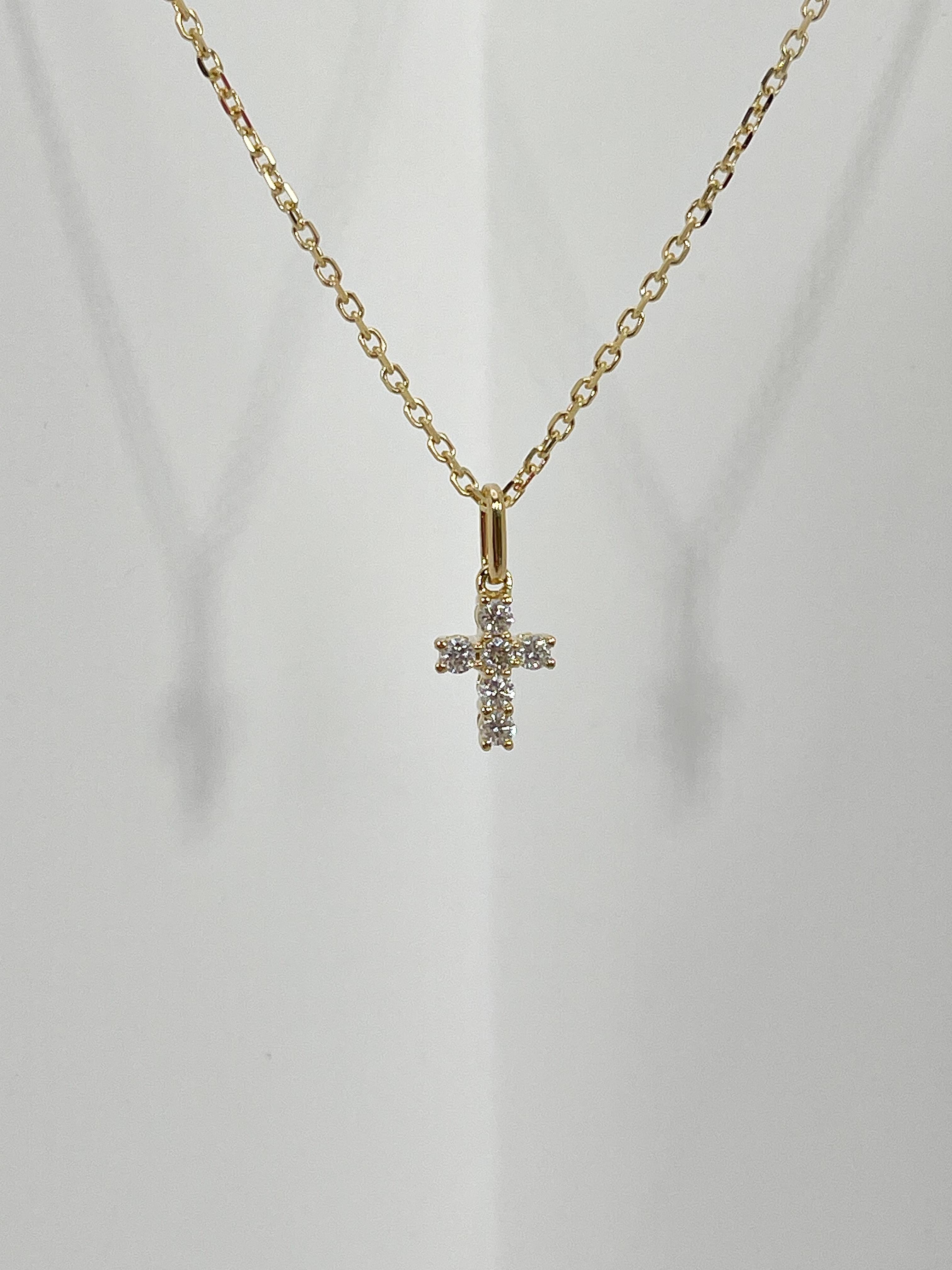 Round Cut 18K Yellow Gold .20 CTW Diamond Cross Pendant Necklace  For Sale