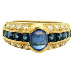 Anillo de oro amarillo de 18 quilates con zafiro cabujón y diamantes de alta calidad de 2,01 ctw