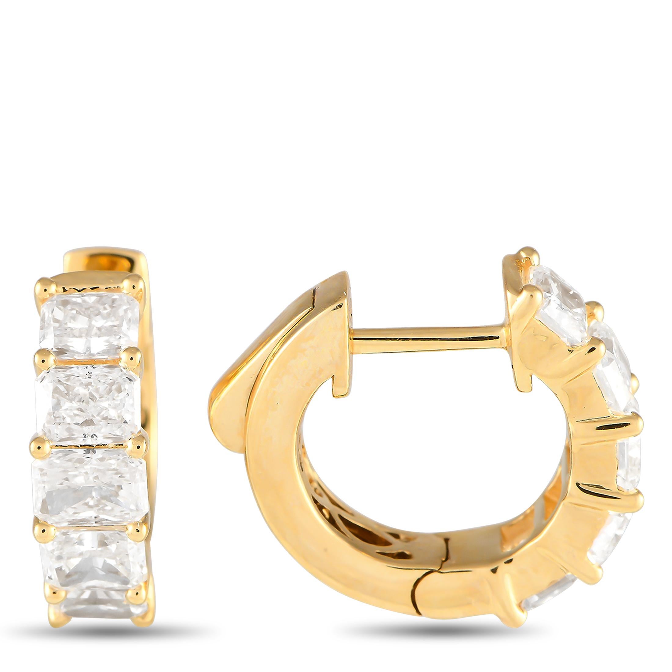 Diamonds with a total weight of 2.05 carats allow these earrings to make a scintillating statement. Crafted from 18K yellow gold, they feature a simple, elegant design that will instantly elevate any ensemble. Each one measures 0.50 round.This