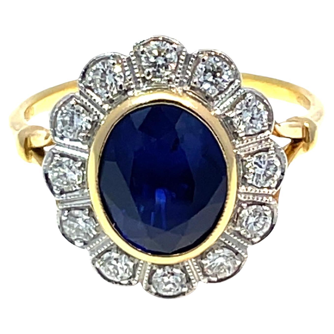 18k Yellow Gold 2.16 Carat Blue Sapphire
Diamond Ring
