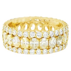 18k Yellow Gold 2.19ctw Oval Diamonds and 1.32ctw Round Diamonds Eternity Band