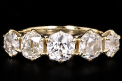 18 Karat Gold 2.38 Carat Total Weight Old Mine Cut Diamond Five-Stone Band