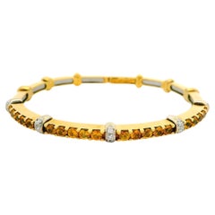 Brazalete flexible de oro amarillo de 18 quilates, 2,40 quilates de diamantes y topacio amarillo