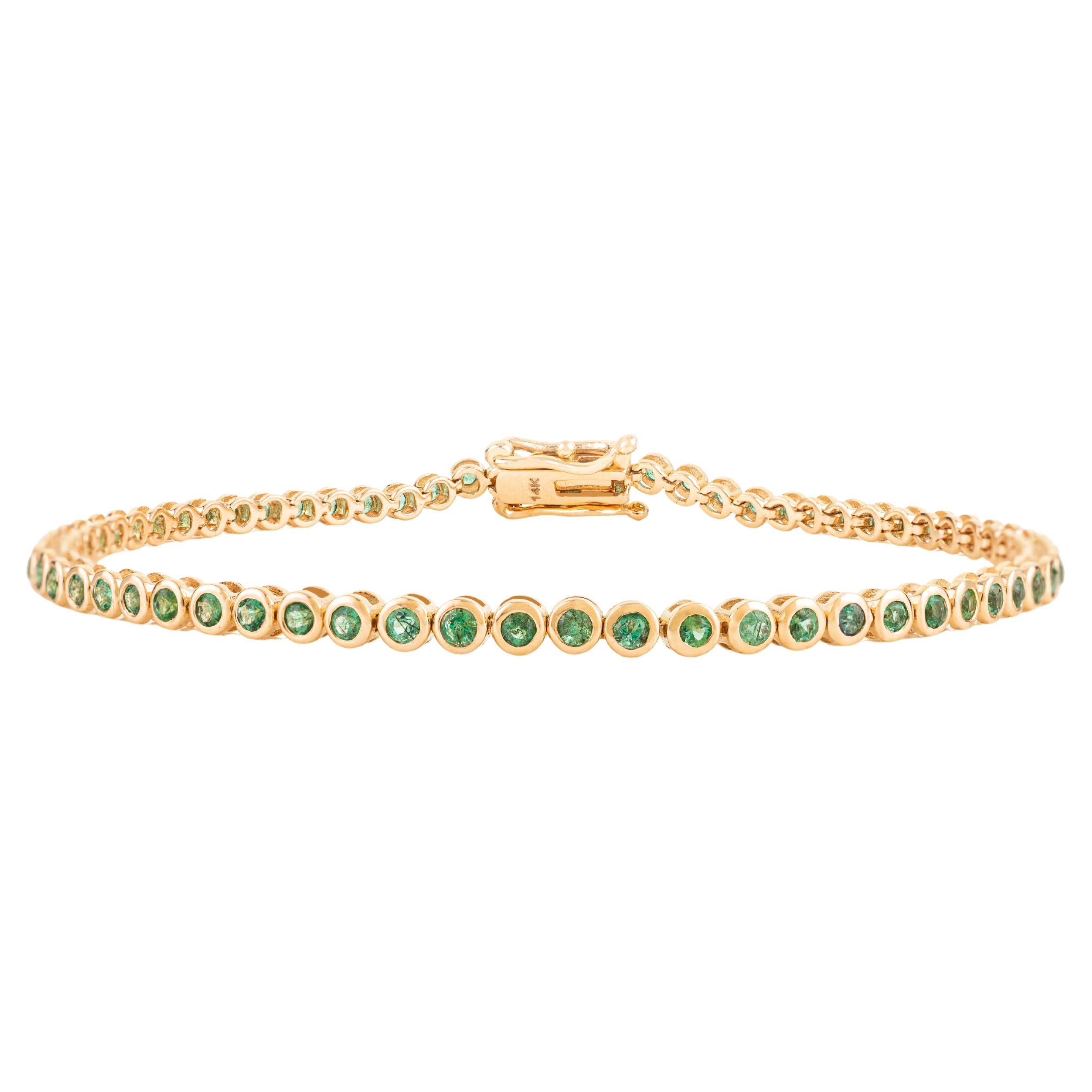 18K Yellow Gold 2.46 Carat Natural Emerald Tennis Bracelet in Bezel Setting