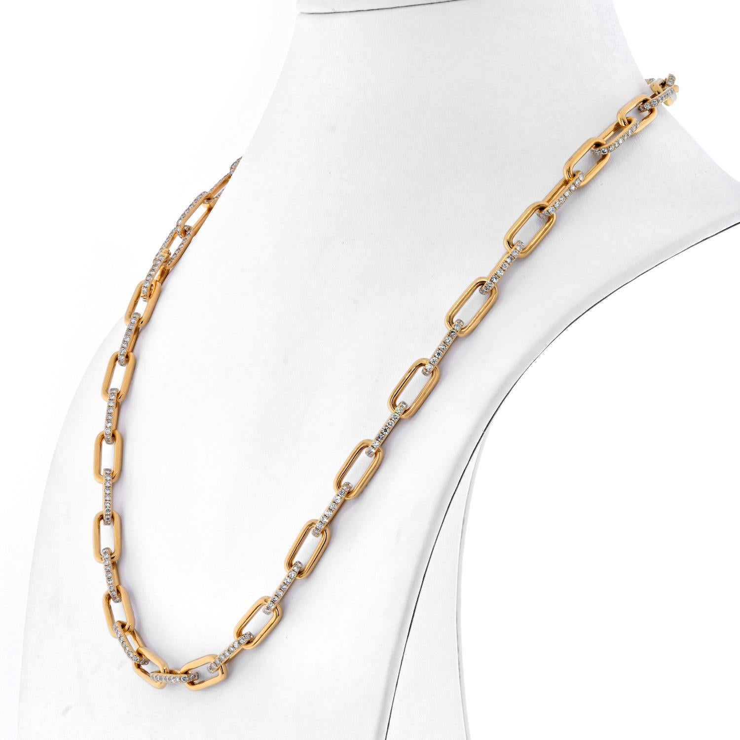 No your average paper clip diamond link chain necklace. Made in solid 18K Yellow Gold this chain diamond necklace is set with round cut diamonds on each link. Each station is solid and is about 2mm thick. 22 inches long this diamond chain offers a