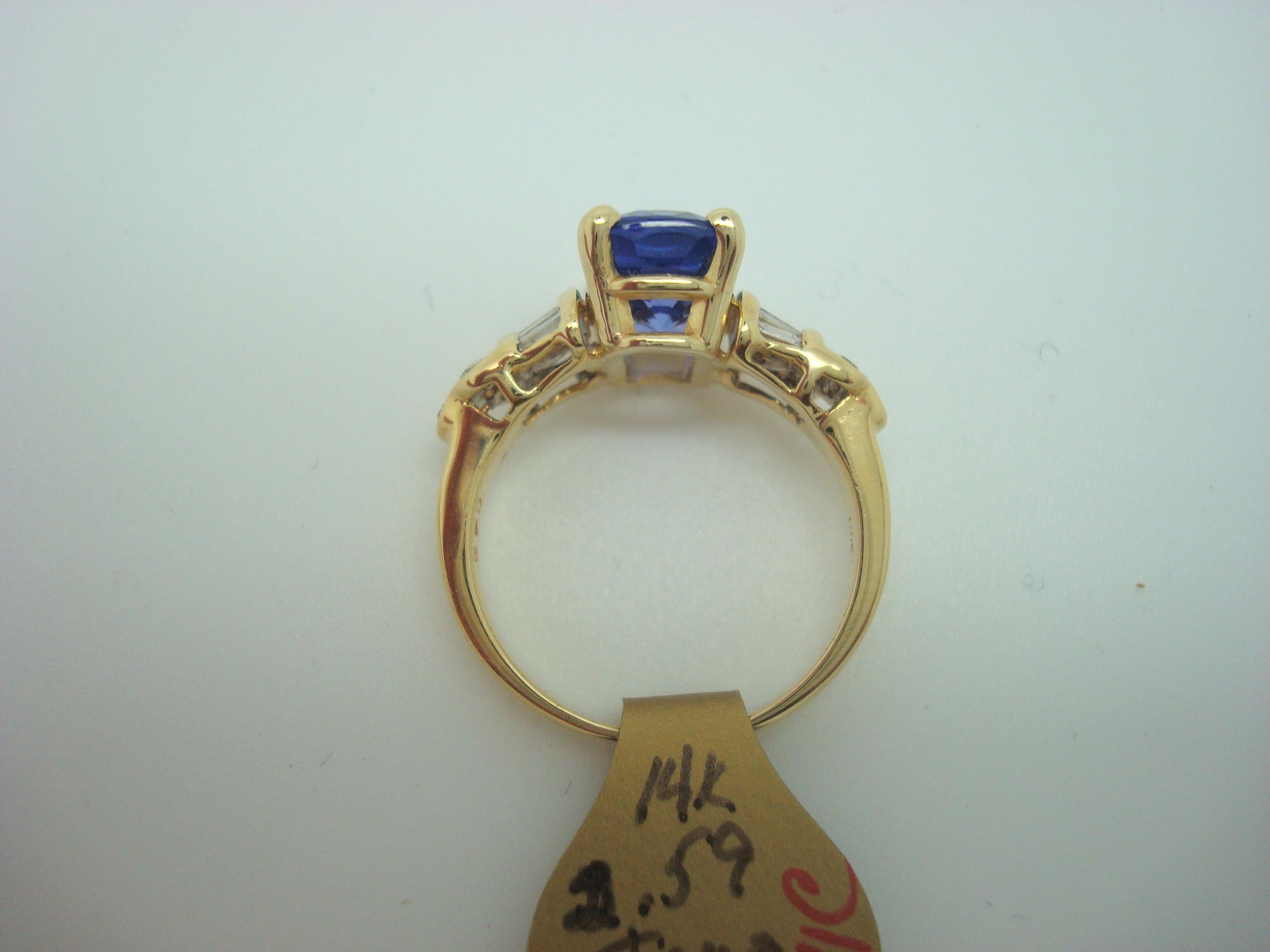 Contemporary 18k Yellow Gold 2.59ct Genuine Natural Tanzanite and Diamond Ring '#J1811' For Sale