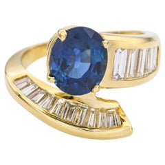 Bague bypass en or jaune 18k avec saphir de Ceylan et diamant de 2,70ct