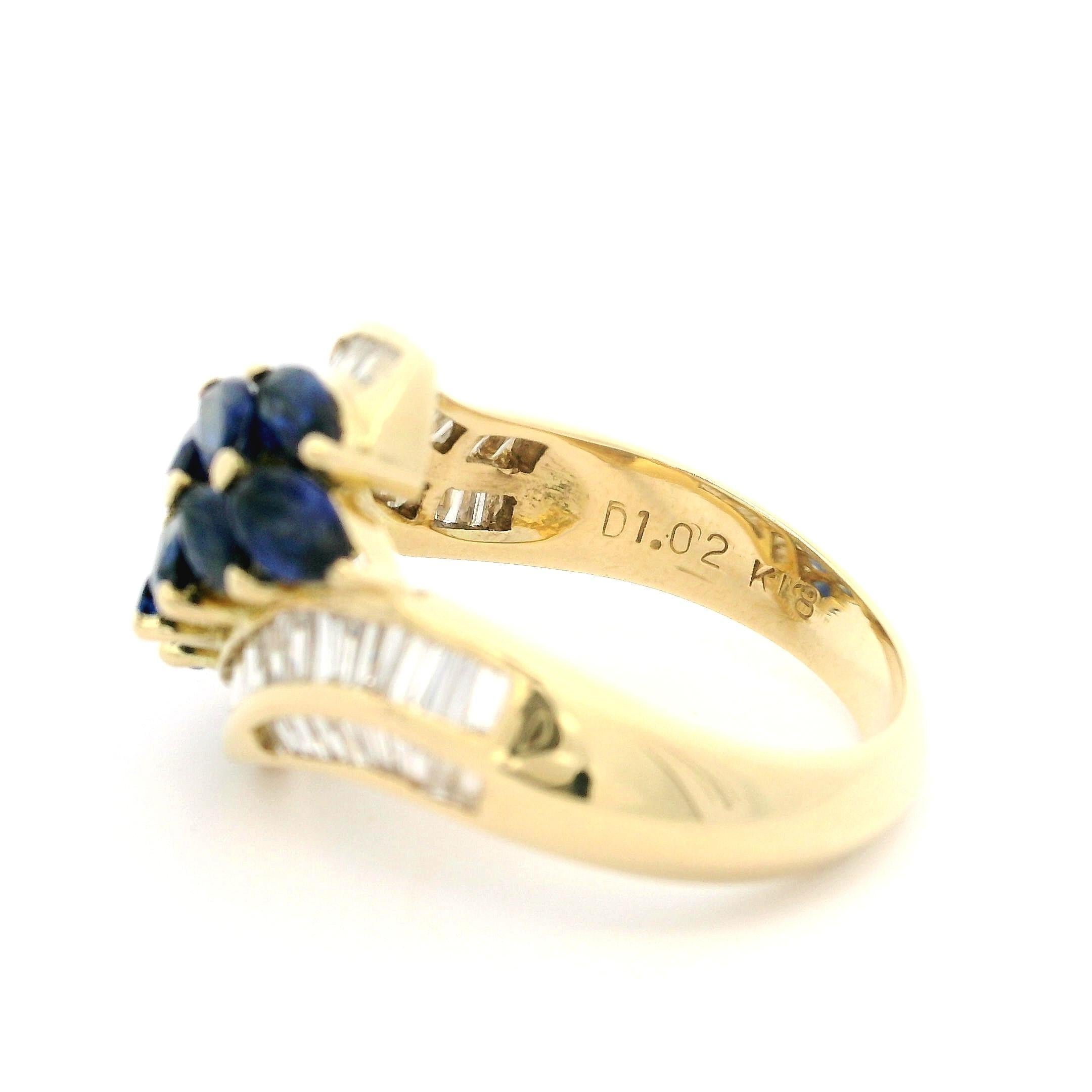 Women's 18k Yellow Gold 3.02ctw Marquise Sapphire & Baguette Diamond Bypass Style Ring For Sale