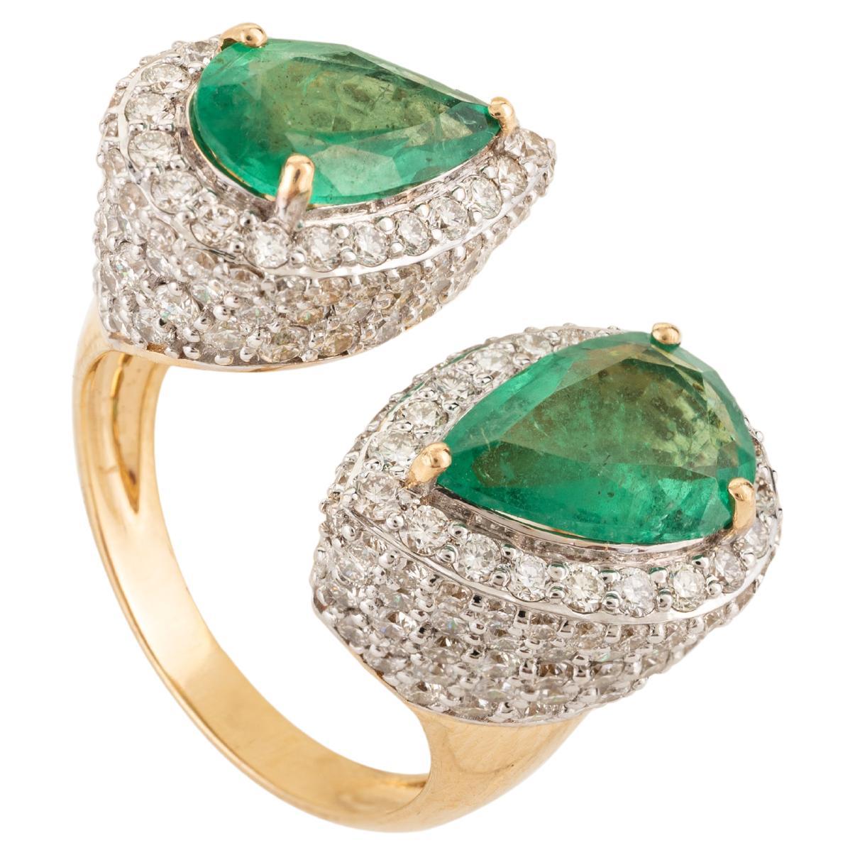 For Sale:  18k Yellow Gold 3.13 Carat Emerald and 3.38 Carat Halo Diamond Toi et Moi Ring
