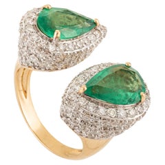 18k Yellow Gold 3.13 Carat Emerald and 3.38 Carat Halo Diamond Toi et Moi Ring
