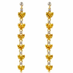 Orecchini a cuore in oro giallo 18K con zaffiro giallo e diamante da 3,24 carati