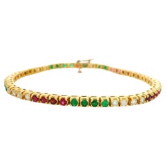 Bracciale tennis in oro giallo 18 carati con rubino smeraldo e diamanti, linea multicolore, 3,36 carati