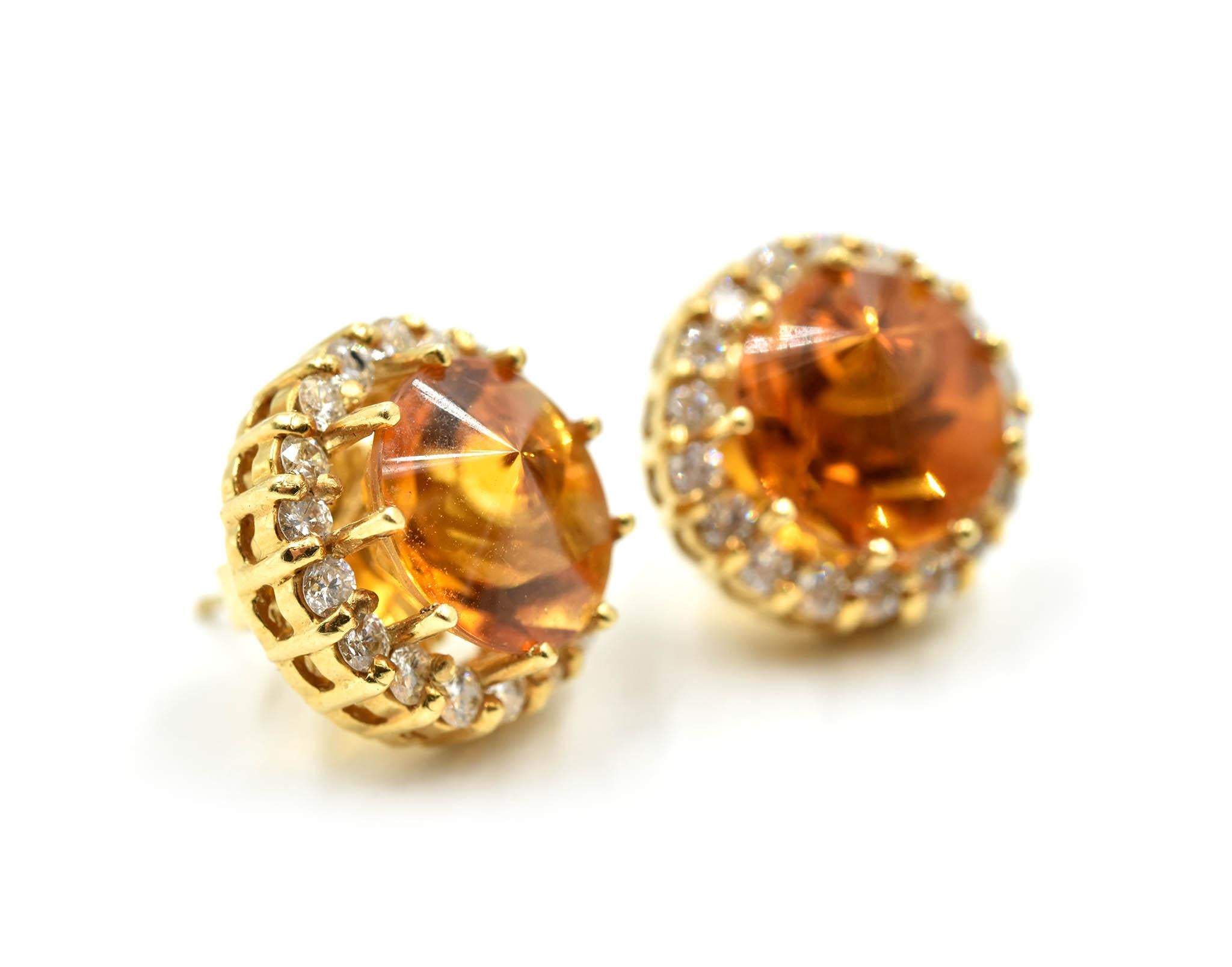 This is a pair of 18k yellow gold earrings featuring fantasy cut citrine gemstones with round diamond halos! Each citrine is cut in a cabochon type shape with a point, and is faceted underneath. Total weight of the citrine gemstones is 4.00 carats.
