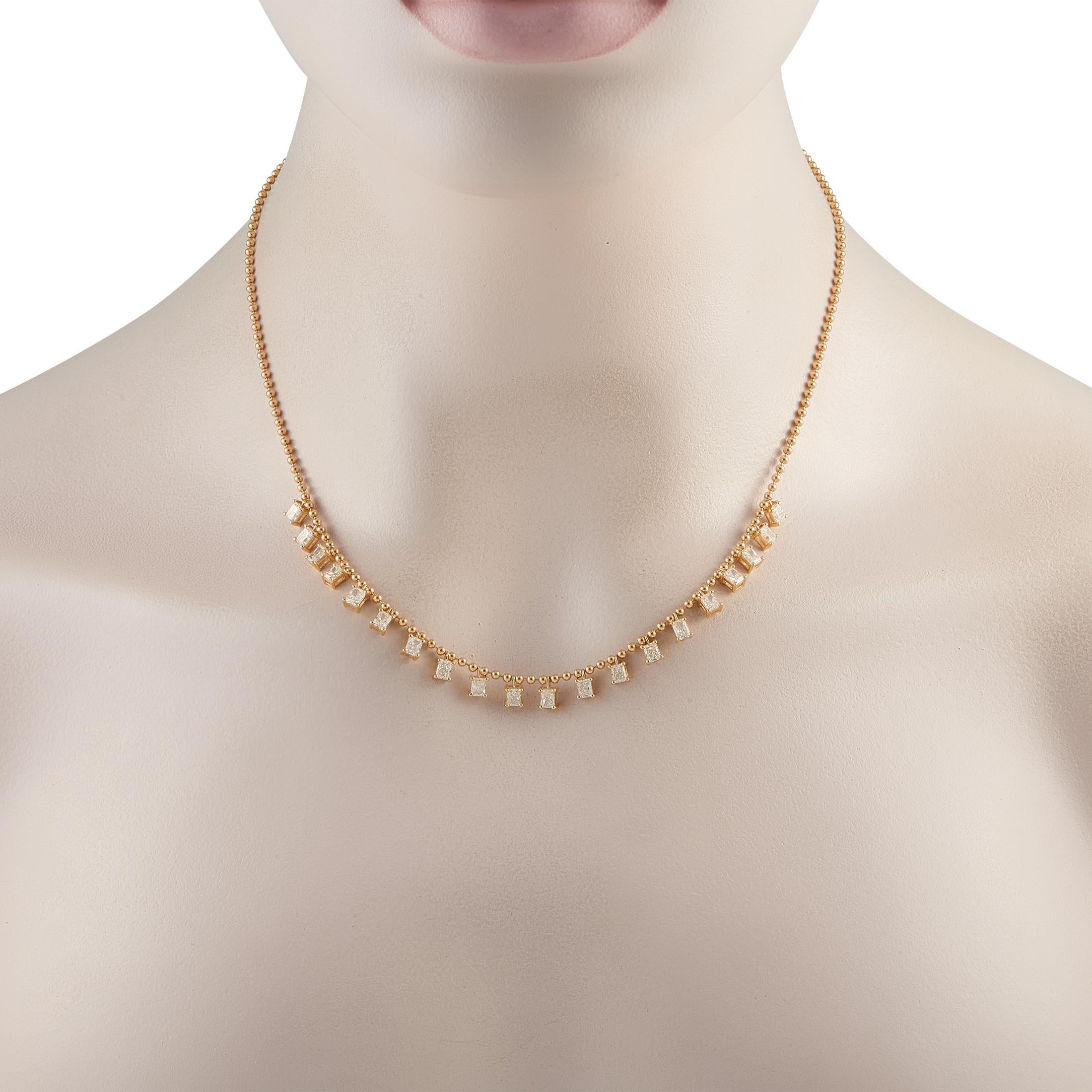 A series of diamonds totaling 4.0 carats dangle delicately from a beaded chain on this breathtaking necklace. Crafted from 18K yellow gold, this impeccably designed accessory will add a touch of luxury to any ensemble. The chain measures 17.5 long