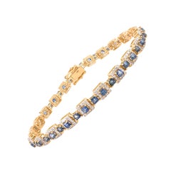 Bracelet de tennis en or jaune 18K avec saphir bleu 4.15 CTW et diamant Halo 1.49 CTW