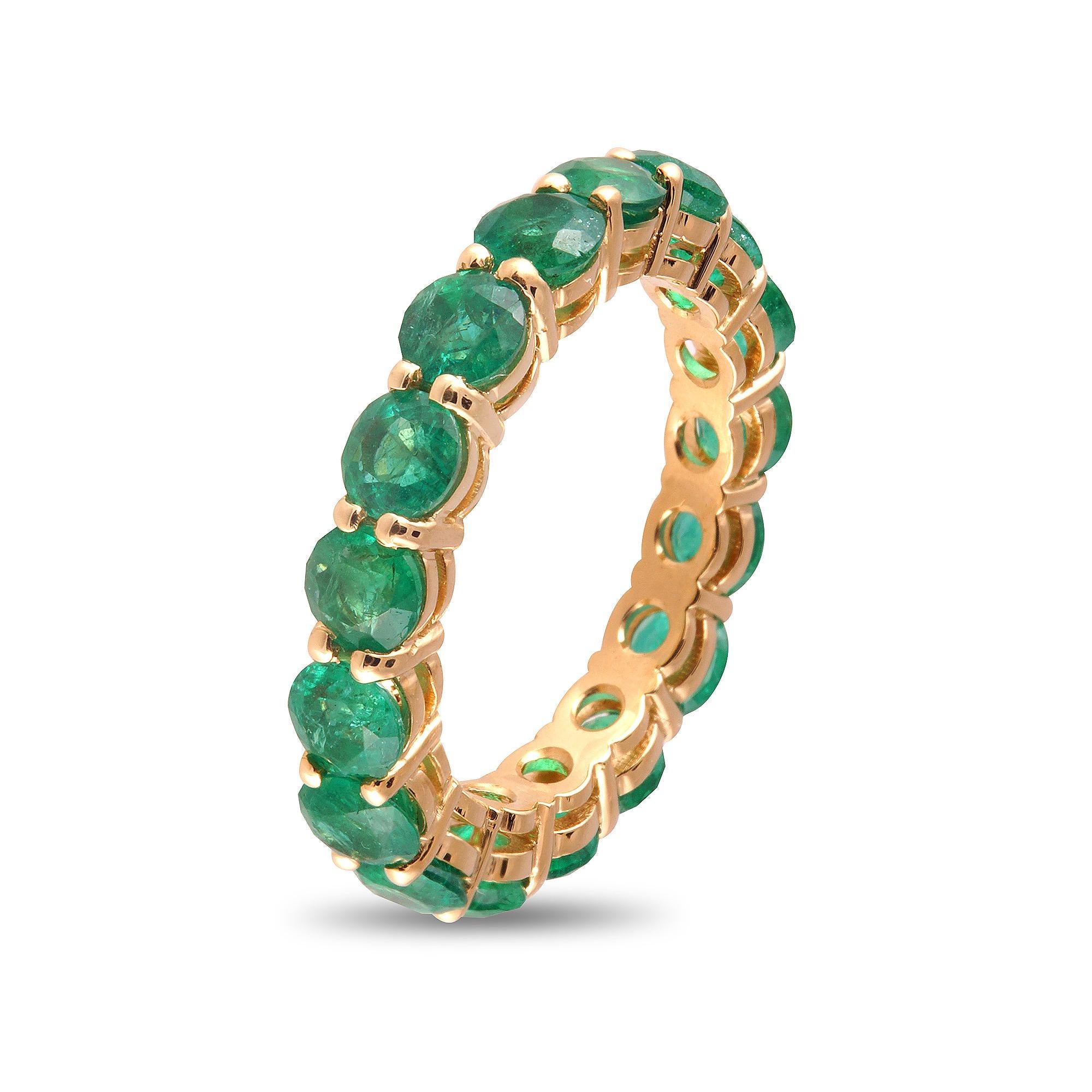Ravishing 4.31 carat Emerald eternity band with shared prongs. Perfect to compliment any ring stack and give it a pop of color. Ideal gift to give to your significant other as a push present or as an anniversary band, since the unbroken circle