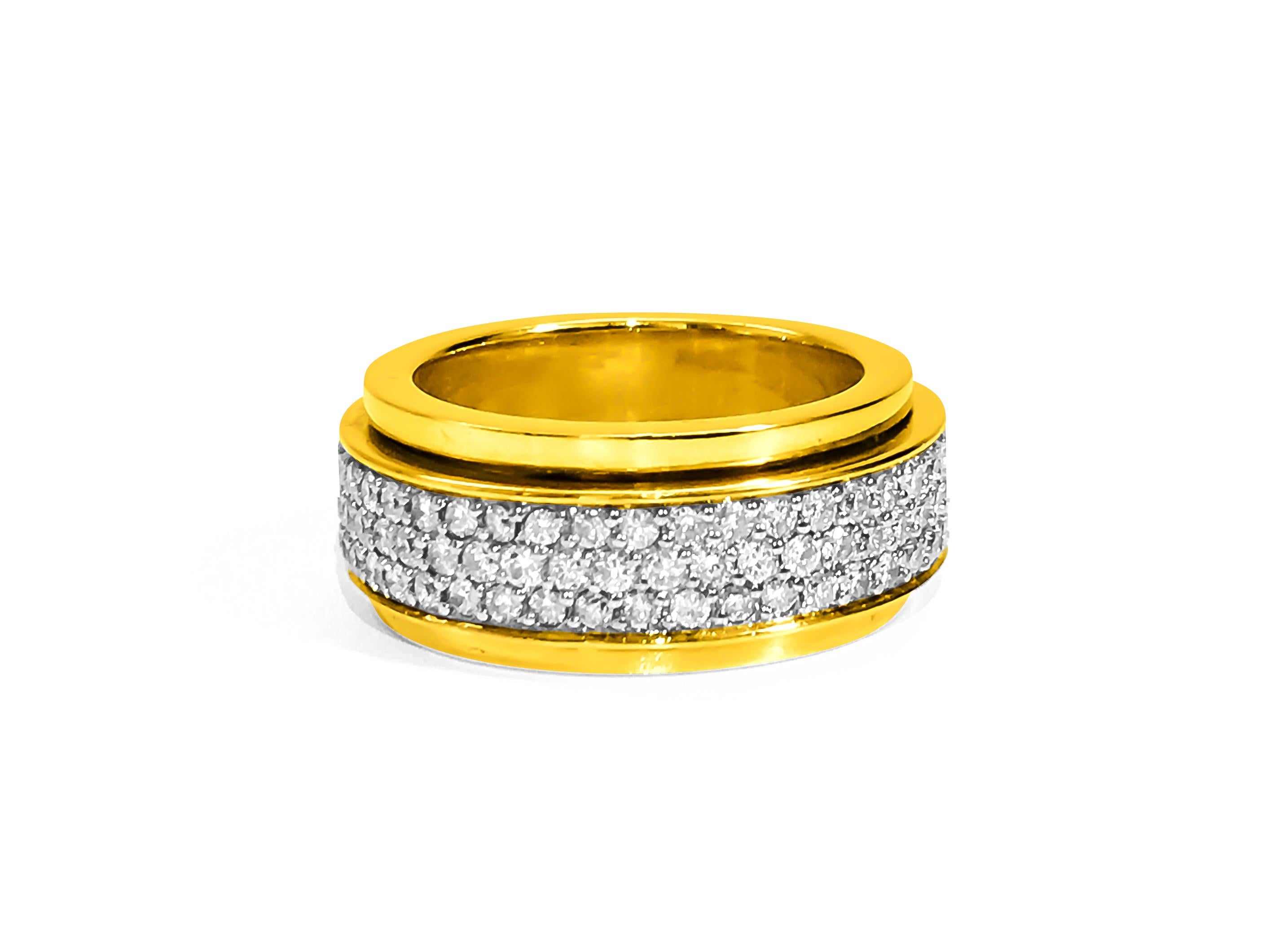 This exquisite ring boasts a luxurious design crafted from 18K yellow gold, adorned with a spectacular array of diamonds totaling 4.50 carats. Each diamond, cut in a round brilliant style, showcases exceptional clarity (VVS) and a stunning F-G color